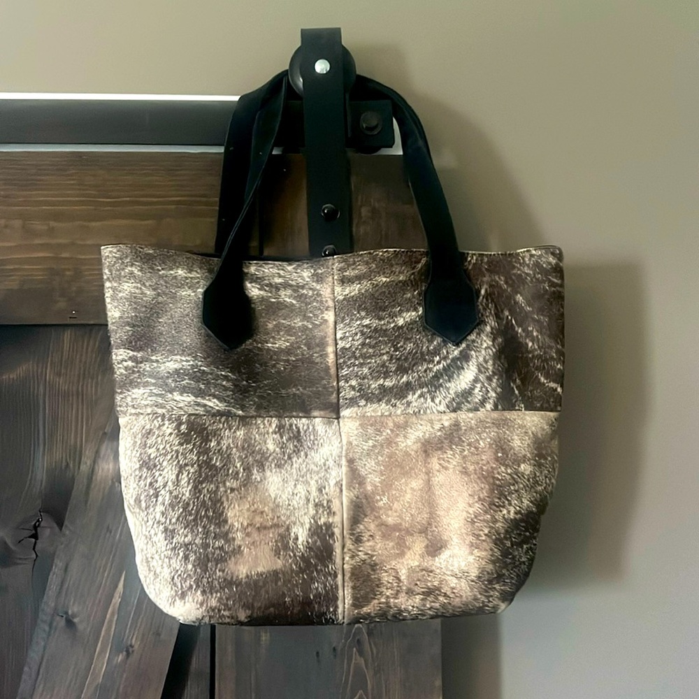Cowhide patchwork bag / tote with leather straps and snap closure